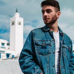 man in blue washed jacket